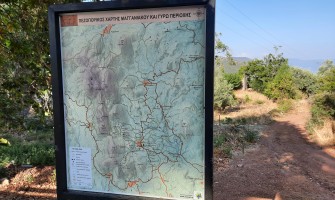Signpost with hiking map in the Peloponnese, in Magganiako